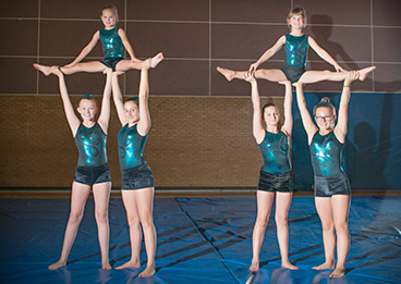 Monmouth Gymnastics Club – Performing Acrobatic Gymnastics