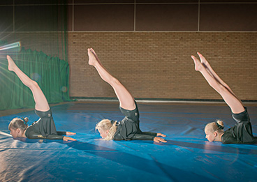 Monmouth Gymnastics Club – Performing Acrobatic Gymnastics